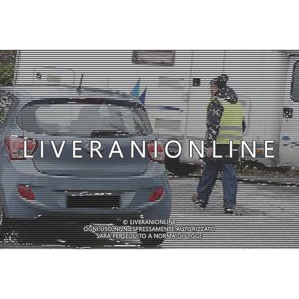 Rimini - Loris Stecca ex campione del mondo di pugilato pesi supergallo WBA 07/03/2018 nella foto: Loris Stecca mentre lavora come parcheggiatore fuori dal carcere ©Claudio Zamagni/Agenzia Aldo Liverani