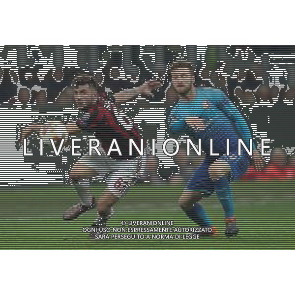 UEFA Europa League 2017/2018 Ottavi di Finale Andata Milano - 08.03.2018 Milan-Arsenal Nella Foto: patrick cutrone e Shkodran Mustafi /Ph.Vitez-Ag. Aldo Liverani