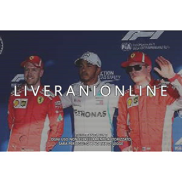Qualifying top three in parc ferme (L to R): Sebastian Vettel (GER) Ferrari, third; Lewis Hamilton (GBR) Mercedes AMG F1, pole position; Kimi Raikkonen (FIN) Ferrari, second. 24.03.2018. Formula 1 World Championship, Rd 1, Australian Grand Prix, Albert Park, Melbourne, Australia, Qualifying Day. AG ALDO LIVERANI SAS ONLY ITALY
