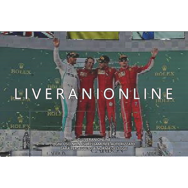 The podium (L to R): Lewis Hamilton (GBR) Mercedes AMG F1, second; Sebastian Vettel (GER) Ferrari, race winner; Kimi Raikkonen (FIN) Ferrari, third. 25.03.2018. Formula 1 World Championship, Rd 1, Australian Grand Prix, Albert Park, Melbourne, Australia, Race Day. / AGENZIA ALDO LIVERANI SAS - ITALY ONLY EDITORIAL USE ONLY