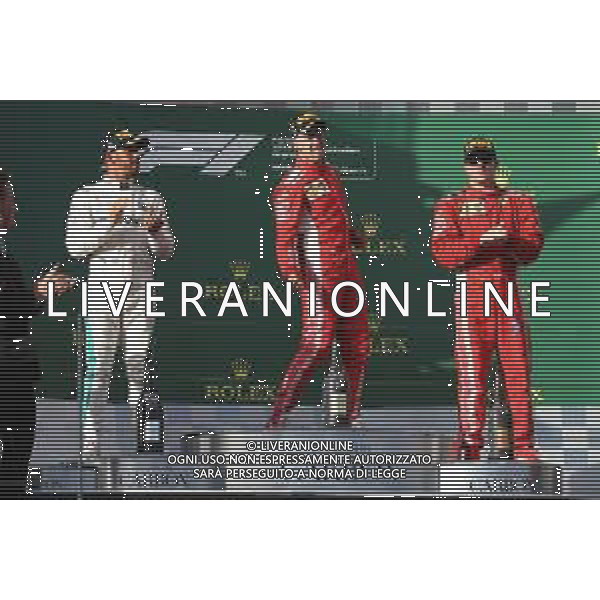 1st place Sebastian Vettel (GER) Ferrari SF71H with 2nd place Lewis Hamilton (GBR) Mercedes AMG F1 W09 and 3rd place Kimi Raikkonen (FIN) Ferrari SF71H. 25.03.2018. Formula 1 World Championship, Rd 1, Australian Grand Prix, Albert Park, Melbourne, Australia, Race Day. / AGENZIA ALDO LIVERANI SAS - ITALY ONLY EDITORIAL USE ONLY