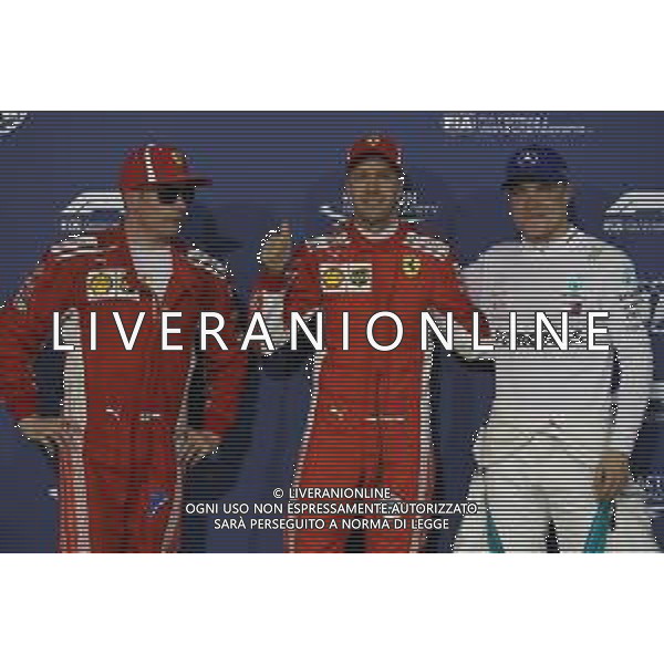Pole for Sebastian Vettel (GER) Ferrari SF71H, 2nd for Kimi Raikkonen (FIN) Ferrari SF71H and 3rd Valtteri Bottas (FIN) Mercedes AMG F1. 07.04.2018. Formula 1 World Championship, Rd 2, Bahrain Grand Prix, Sakhir, Bahrain, Qualifying Day. / AGENZIA ALDO LIVERANI SAS - ITALY ONLY EDITORIAL USE ONLY - F1 Motor Racing - Formula One World Championship - Bahrain Grand Prix - Prove Ufficiali Qualifiche Sakhir, Bahrain 07.04.2018