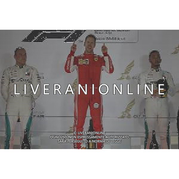 1st place Sebastian Vettel (GER) Ferrari SF71H, 2nd Valtteri Bottas (FIN) Mercedes AMG F1 and 3rd place Lewis Hamilton (GBR) Mercedes AMG F1 W09. 08.04.2018. Formula 1 World Championship, Rd 2, Bahrain Grand Prix, Sakhir, Bahrain, Race Day. / AGENZIA ALDO LIVERANI SAS - ITALY ONLY EDITORIAL USE ONLY - F1 Motor Racing - Formula One World Championship - Bahrain Grand Prix - Race Day - Sakhir, Bahrain Gara 08.04.2018