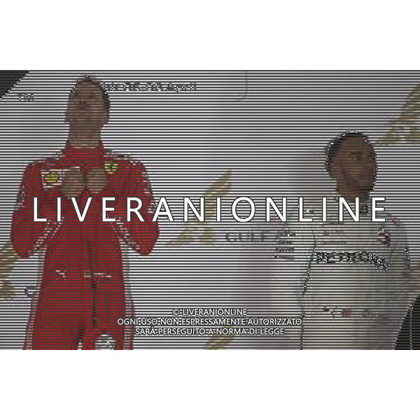 1st place for Sebastian Vettel (GER) Ferrari SF71H, 2nd for Lewis Hamilton (GBR) Mercedes AMG F1 W09. 08.04.2018. Formula 1 World Championship, Rd 2, Bahrain Grand Prix, Sakhir, Bahrain, Race Day. / AGENZIA ALDO LIVERANI SAS - ITALY ONLY EDITORIAL USE ONLY - F1 Motor Racing - Formula One World Championship - Bahrain Grand Prix - Race Day - Sakhir, Bahrain Gara 08.04.2018