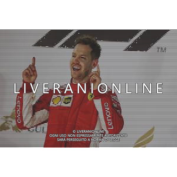 Race winner Sebastian Vettel (GER) Ferrari celebrates on the podium. 08.04.2018. Formula 1 World Championship, Rd 2, Bahrain Grand Prix, Sakhir, Bahrain, Race Day. / AGENZIA ALDO LIVERANI SAS - ITALY ONLY EDITORIAL USE ONLY - F1 Motor Racing - Formula One World Championship - Bahrain Grand Prix - Race Day - Sakhir, Bahrain Gara 08.04.2018