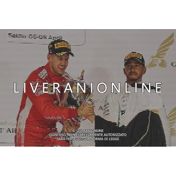 Race winner Sebastian Vettel (GER) Ferrari celebrates on the podium. 08.04.2018. Formula 1 World Championship, Rd 2, Bahrain Grand Prix, Sakhir, Bahrain, Race Day. / AGENZIA ALDO LIVERANI SAS - ITALY ONLY EDITORIAL USE ONLY - F1 Motor Racing - Formula One World Championship - Bahrain Grand Prix - Race Day - Sakhir, Bahrain Gara 08.04.2018