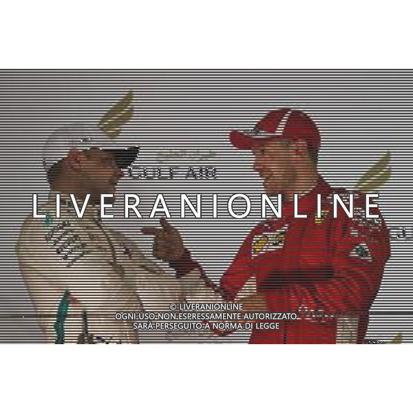 (L to R): Valtteri Bottas (FIN) Mercedes AMG F1 on the podium with race winner Sebastian Vettel (GER) Ferrari. 08.04.2018. Formula 1 World Championship, Rd 2, Bahrain Grand Prix, Sakhir, Bahrain, Race Day. / AGENZIA ALDO LIVERANI SAS - ITALY ONLY EDITORIAL USE ONLY - F1 Motor Racing - Formula One World Championship - Bahrain Grand Prix - Race Day - Sakhir, Bahrain Gara 08.04.2018