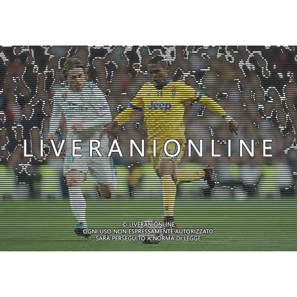 UEFA Champions League 2017/2018 Quarti di Finale Ritorno Madrid - 11.04.2018 Real Madrid-Juventus Nella Foto:Douglas Costa - Modric Luka /Ph.Vitez-Ag. Aldo Liverani