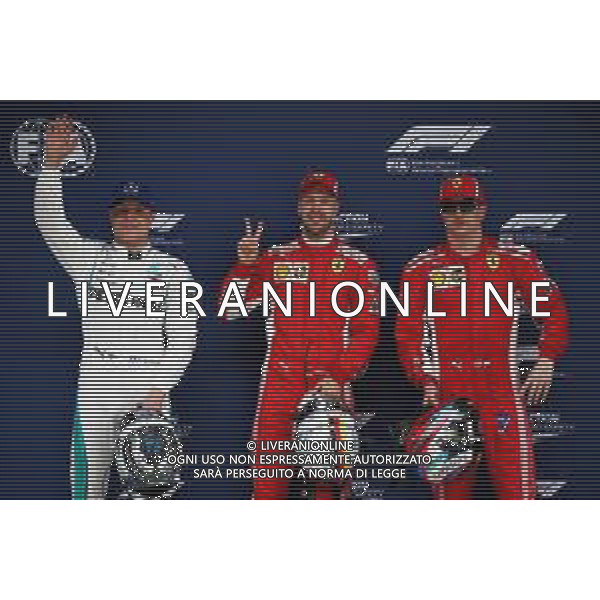 Qualifying top three in parc ferme (L to R): Valtteri Bottas (FIN) Mercedes AMG F1, third; Sebastian Vettel (GER) Ferrari, pole position; Kimi Raikkonen (FIN) Ferrari, second. 14.04.2018. Formula 1 World Championship, Rd 3, Chinese Grand Prix, Shanghai, China, Qualifying Day. / AGENZIA ALDO LIVERANI SAS - ITALY ONLY EDITORIAL USE ONLY - F1 Gp Cina Prove Ufficiali Qualifiche , Motor Racing - Formula One World Championship - Chinese Grand Prix - Practice Day - Shanghai, China 14.04.2018