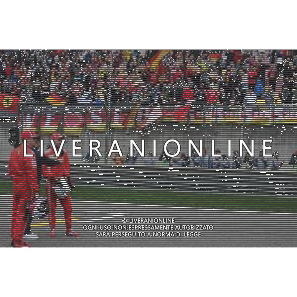 Kimi Raikkonen (FIN) Scuderia Ferrari and Sebastian Vettel (GER) Scuderia Ferrari 14.04.2018. Formula 1 World Championship, Rd 3, Chinese Grand Prix, Shanghai, China, Qualifying Day. / AGENZIA ALDO LIVERANI SAS - ITALY ONLY EDITORIAL USE ONLY - F1 Gp Cina Prove Ufficiali Qualifiche , Motor Racing - Formula One World Championship - Chinese Grand Prix - Practice Day - Shanghai, China 14.04.2018
