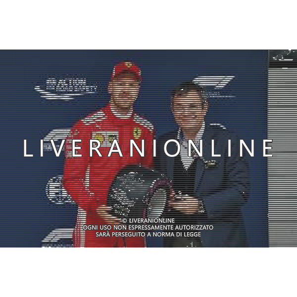 Sebastian Vettel (GER) Ferrari with his Pole position Award in qualifying parc ferme. 14.04.2018. Formula 1 World Championship, Rd 3, Chinese Grand Prix, Shanghai, China, Qualifying Day. / AGENZIA ALDO LIVERANI SAS - ITALY ONLY EDITORIAL USE ONLY - F1 Gp Cina Prove Ufficiali Qualifiche , Motor Racing - Formula One World Championship - Chinese Grand Prix - Practice Day - Shanghai, China 14.04.2018