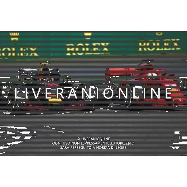 Max Verstappen (NLD) Red Bull Racing and Sebastian Vettel (GER) Scuderia Ferrari collide during the race 15.04.2018. Formula 1 World Championship, Rd 3, Chinese Grand Prix, Shanghai, China, Race Day. / AGENZIA ALDO LIVERANI SAS - ITALY ONLY EDITORIAL USE ONLY
