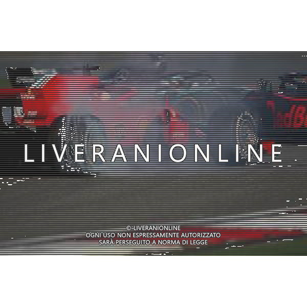 Max Verstappen (NLD) Red Bull Racing and Sebastian Vettel (GER) Scuderia Ferrari collide during the race 15.04.2018. Formula 1 World Championship, Rd 3, Chinese Grand Prix, Shanghai, China, Race Day. / AGENZIA ALDO LIVERANI SAS - ITALY ONLY EDITORIAL USE ONLY