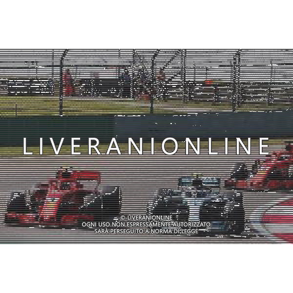 Valtteri Bottas (FIN) Mercedes AMG F1 W09 and Kimi Raikkonen (FIN) Ferrari SF71H battle for position. 15.04.2018. Formula 1 World Championship, Rd 3, Chinese Grand Prix, Shanghai, China, Race Day. / AGENZIA ALDO LIVERANI SAS - ITALY ONLY EDITORIAL USE ONLY