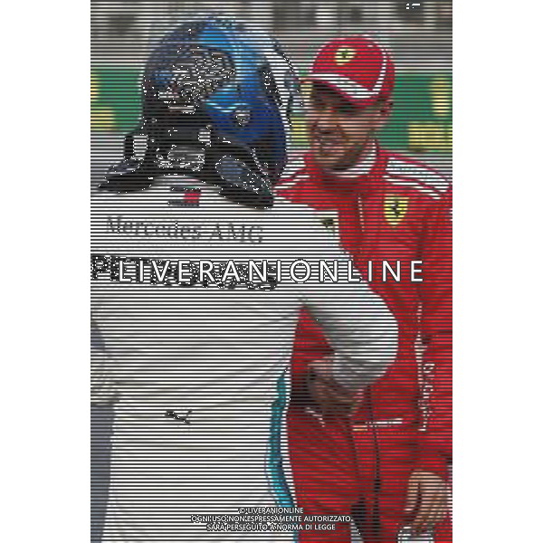 Sebastian Vettel (GER) Ferrari (Right) celebrates his pole position with third placed Valtteri Bottas (FIN) Mercedes AMG F1 in qualifying parc ferme. 28.04.2018. Formula 1 World Championship, Rd 4, Azerbaijan Grand Prix, Baku Street Circuit, Azerbaijan, Qualifying Day. / AGENZIA ALDO LIVERANI SAS - ITALY ONLY EDITORIAL USE ONLY - F1 - Formula One World Championship - Azerbaijan Grand Prix - Prove Ufficiali Qualifiche Baku, Azerbaijan 28.04.2018