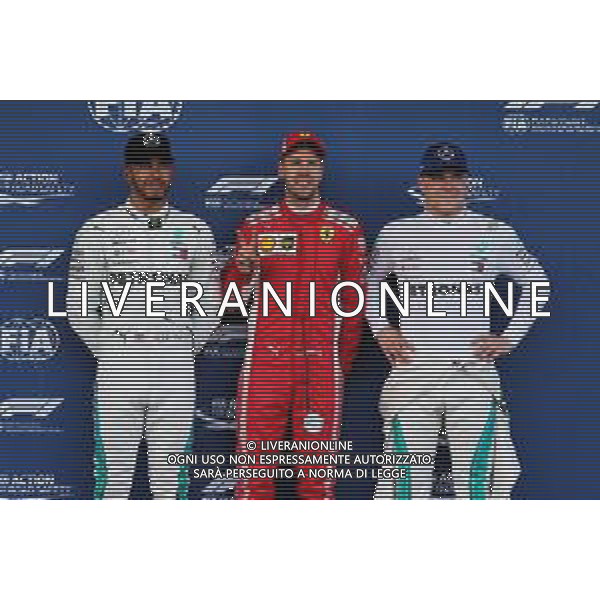 Qualifying top three in parc ferme (L to R): Lewis Hamilton (GBR) Mercedes AMG F1, second; Sebastian Vettel (GER) Ferrari, pole position; Valtteri Bottas (FIN) Mercedes AMG F1, third. 28.04.2018. Formula 1 World Championship, Rd 4, Azerbaijan Grand Prix, Baku Street Circuit, Azerbaijan, Qualifying Day. / AGENZIA ALDO LIVERANI SAS - ITALY ONLY EDITORIAL USE ONLY - F1 - Formula One World Championship - Azerbaijan Grand Prix - Prove Ufficiali Qualifiche Baku, Azerbaijan 28.04.2018