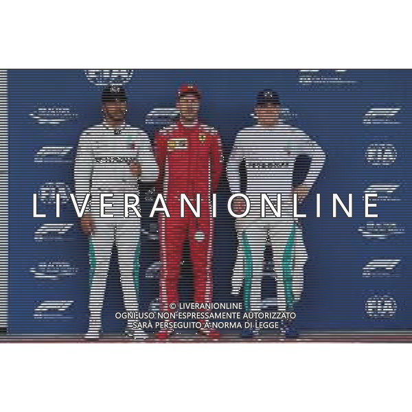 Qualifying top three in parc ferme (L to R): Lewis Hamilton (GBR) Mercedes AMG F1, second; Sebastian Vettel (GER) Ferrari, pole position; Valtteri Bottas (FIN) Mercedes AMG F1, third. 28.04.2018. Formula 1 World Championship, Rd 4, Azerbaijan Grand Prix, Baku Street Circuit, Azerbaijan, Qualifying Day. / AGENZIA ALDO LIVERANI SAS - ITALY ONLY EDITORIAL USE ONLY - F1 - Formula One World Championship - Azerbaijan Grand Prix - Prove Ufficiali Qualifiche Baku, Azerbaijan 28.04.2018
