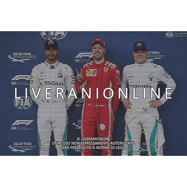 Qualifying top three in parc ferme (L to R): Lewis Hamilton (GBR) Mercedes AMG F1, second; Sebastian Vettel (GER) Ferrari, pole position; Valtteri Bottas (FIN) Mercedes AMG F1, third. 28.04.2018. Formula 1 World Championship, Rd 4, Azerbaijan Grand Prix, Baku Street Circuit, Azerbaijan, Qualifying Day. / AGENZIA ALDO LIVERANI SAS - ITALY ONLY EDITORIAL USE ONLY - F1 - Formula One World Championship - Azerbaijan Grand Prix - Prove Ufficiali Qualifiche Baku, Azerbaijan 28.04.2018