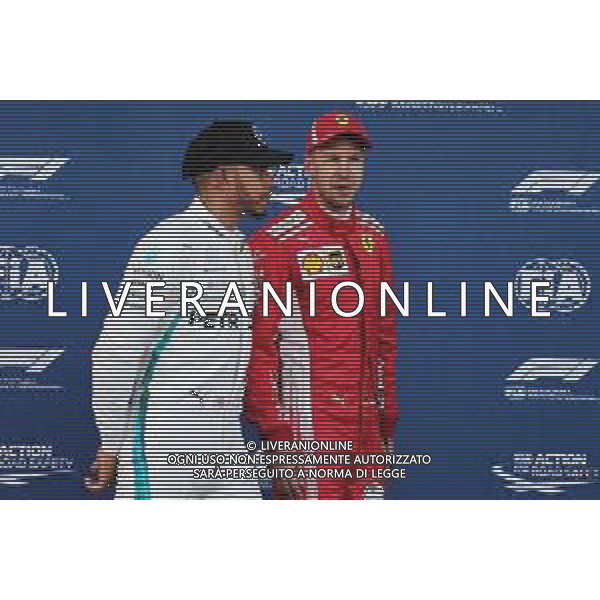 (L to R): Lewis Hamilton (GBR) Mercedes AMG F1 and Sebastian Vettel (GER) Ferrari in qualifying parc ferme. 28.04.2018. Formula 1 World Championship, Rd 4, Azerbaijan Grand Prix, Baku Street Circuit, Azerbaijan, Qualifying Day. / AGENZIA ALDO LIVERANI SAS - ITALY ONLY EDITORIAL USE ONLY - F1 - Formula One World Championship - Azerbaijan Grand Prix - Prove Ufficiali Qualifiche Baku, Azerbaijan 28.04.2018