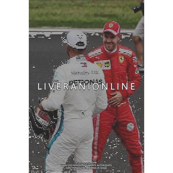 (L to R): Lewis Hamilton (GBR) Mercedes AMG F1 with Sebastian Vettel (GER) Ferrari in qualifying parc ferme. 12.05.2018. Formula 1 World Championship, Rd 5, Spanish Grand Prix, Barcelona, Spain, Qualifying Day. / AGENZIA ALDO LIVERANI SAS - ITALY ONLY EDITORIAL USE ONLY - F1 Gp Spagna Prove Ufficiali Qualifiche Barcellona 12.05.2018
