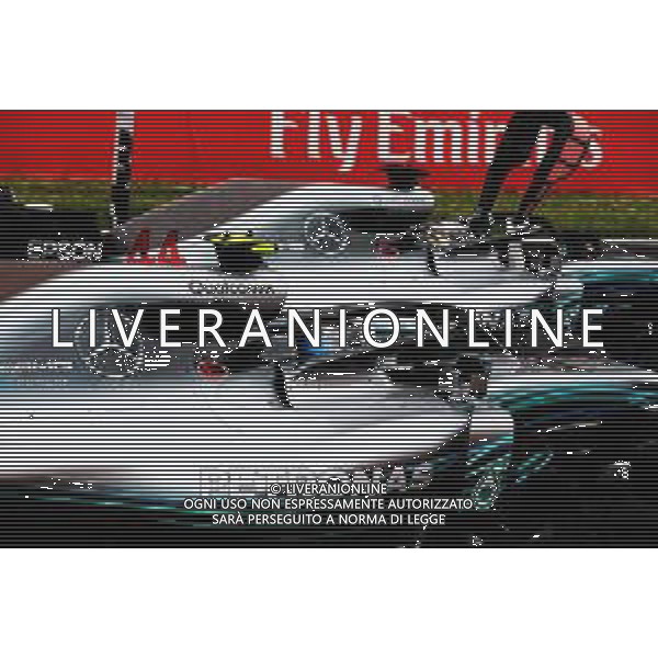 Valtteri Bottas (FIN) Mercedes AMG F1 W09 and team mate Lewis Hamilton (GBR) Mercedes AMG F1 W09 in qualifying parc ferme. 12.05.2018. Formula 1 World Championship, Rd 5, Spanish Grand Prix, Barcelona, Spain, Qualifying Day. / AGENZIA ALDO LIVERANI SAS - ITALY ONLY EDITORIAL USE ONLY - F1 Gp Spagna Prove Ufficiali Qualifiche Barcellona 12.05.2018