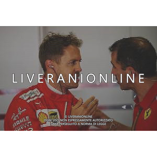 (L to R): Sebastian Vettel (GER) Ferrari with Marc Gene (ESP) Ferrari Test Driver. 11.05.2018. Formula 1 World Championship, Rd 5, Spanish Grand Prix, Barcelona, Spain, Practice Day. / AGENZIA ALDO LIVERANI SAS - ITALY ONLY EDITORIAL USE ONLY - F1 GP SPAGNA PROVE LIBERE BARCELLONA 11.05.2018
