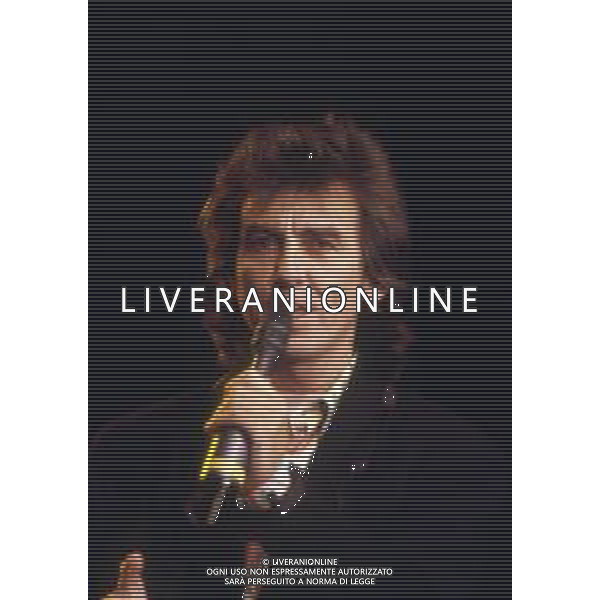 GEORGE HARRISON, cantautore, compositore britannico, ex chitarrista dei Beatles - RETROSPETTIVA nella foto ospite internazionale al festival di Sanremo nel 1988 © ARCHIVIO/ AGENZIA ALDO LIVERANI SAS