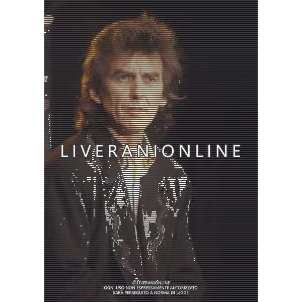 GEORGE HARRISON, cantautore, compositore britannico, ex chitarrista dei Beatles - RETROSPETTIVA nella foto ospite internazionale al festival di Sanremo nel 1988 © ARCHIVIO/ AGENZIA ALDO LIVERANI SAS