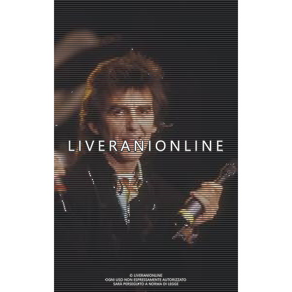 GEORGE HARRISON, cantautore, compositore britannico, ex chitarrista dei Beatles - RETROSPETTIVA nella foto ospite internazionale al festival di Sanremo nel 1988 © ARCHIVIO/ AGENZIA ALDO LIVERANI SAS