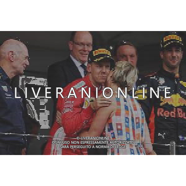 Sebastian Vettel (GER) Ferrari celebrates his second position on the podium with Princess Charlene of Monaco. 27.05.2018. Formula 1 World Championship, Rd 6, Monaco Grand Prix, Monte Carlo, Monaco, Race Day. / AGENZIA ALDO LIVERANI SAS - ITALY ONLY EDITORIAL USE ONLY - F1 Gp Monaco Gara Montecarlo 27.05.2018