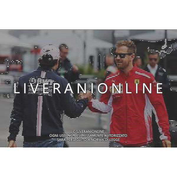 (L to R): Sergio Perez (MEX) Sahara Force India F1 with Sebastian Vettel (GER) Ferrari. 07.06.2018. Formula 1 World Championship, Rd 7, Canadian Grand Prix, Montreal, Canada, Preparation Day. / AGENZIA ALDO LIVERANI SAS - ITALY ONLY EDITORIAL USE ONLY