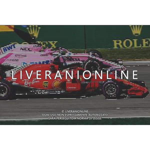 Sebastian Vettel (GER) Ferrari SF71H and Esteban Ocon (FRA) Sahara Force India F1 VJM11. 08.06.2018. Formula 1 World Championship, Rd 7, Canadian Grand Prix, Montreal, Canada, Practice Day. / AGENZIA ALDO LIVERANI SAS - ITALY ONLY EDITORIAL USE ONLY