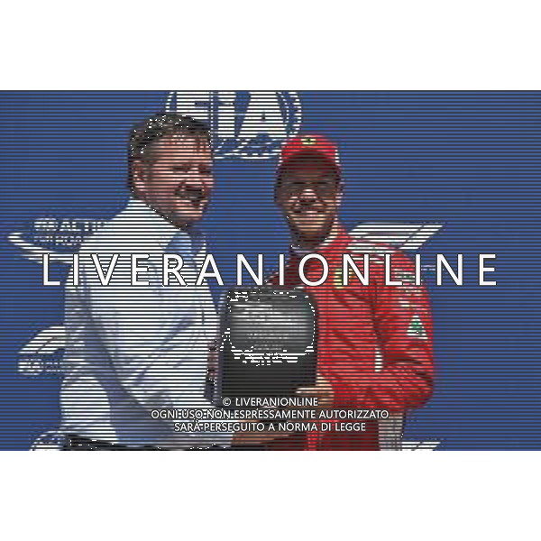 Sebastian Vettel (GER) Ferrari receives the Pirelli Pole Position Award from Paul Hembery (GBR) Pirelli Motorsport Director in qualifying parc ferme. 09.06.2018. Formula 1 World Championship, Rd 7, Canadian Grand Prix, Montreal, Canada, Qualifying Day. AG ALDO LIVERANI SAS-ONLY ITALY