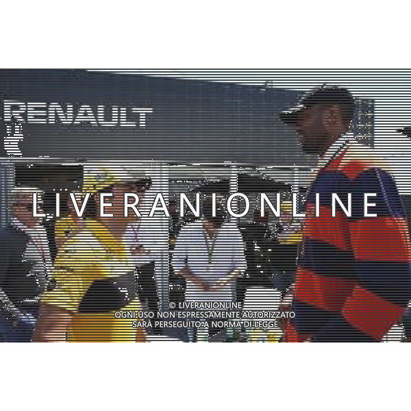 Carlos Sainz Jr (ESP) Renault Sport F1 Team with Serge Ibaka (COG) NBA Basketball Player. 10.06.2018. Formula 1 World Championship, Rd 7, Canadian Grand Prix, Montreal, Canada, Race Day. AG ALDO LIVERANI SAS-ONLY ITALY