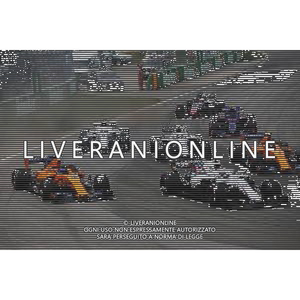 Fernando Alonso (ESP) McLaren MCL33 and Lance Stroll (CDN) Williams FW41 at the start of the race. 10.06.2018. Formula 1 World Championship, Rd 7, Canadian Grand Prix, Montreal, Canada, Race Day. AG ALDO LIVERANI SAS-ONLY ITALY