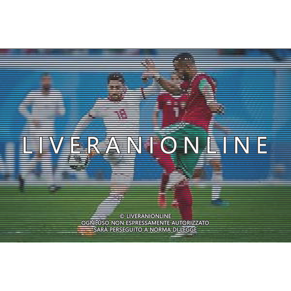 15.06.2018 PETERSBURG SAINT PETERSBURG STADIUM PILKA NOZNA (FOOTBALL) MISTRZOSTWA SWIATA ROSJA 2018 FIFA WORLD CUP RUSSIA 2018 MAROKO - IRAN (MOROCCO - IRAN) NZ ALIREZA JAHANBAKHSH ROMAIN SAISS FOTO LUKASZ SKWIOT/CYFRASPORT / NEWSPIX.PL --- Newspix.pl / AGENZIA ALDO LIVERANI SAS - ITALY ONLY EDITORIAL USE ONLY - MAROCCO - IRAN Campionati Mondiali di calcio - Football FIFA World Cup Russia 15.06.2018