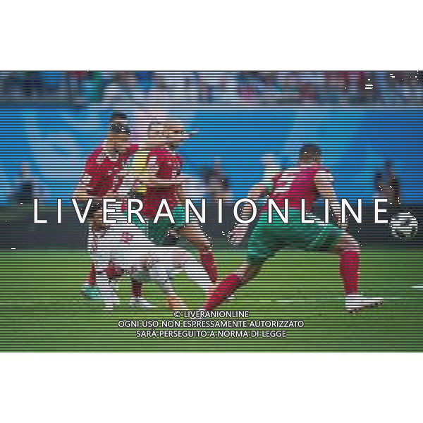 15.06.2018 PETERSBURG SAINT PETERSBURG STADIUM PILKA NOZNA (FOOTBALL) MISTRZOSTWA SWIATA ROSJA 2018 FIFA WORLD CUP RUSSIA 2018 MAROKO - IRAN (MOROCCO - IRAN) NZ ALIREZA JAHANBAKHSH ROMAIN SAISS FOTO LUKASZ SKWIOT/CYFRASPORT / NEWSPIX.PL --- Newspix.pl / AGENZIA ALDO LIVERANI SAS - ITALY ONLY EDITORIAL USE ONLY - MAROCCO - IRAN Campionati Mondiali di calcio - Football FIFA World Cup Russia 15.06.2018