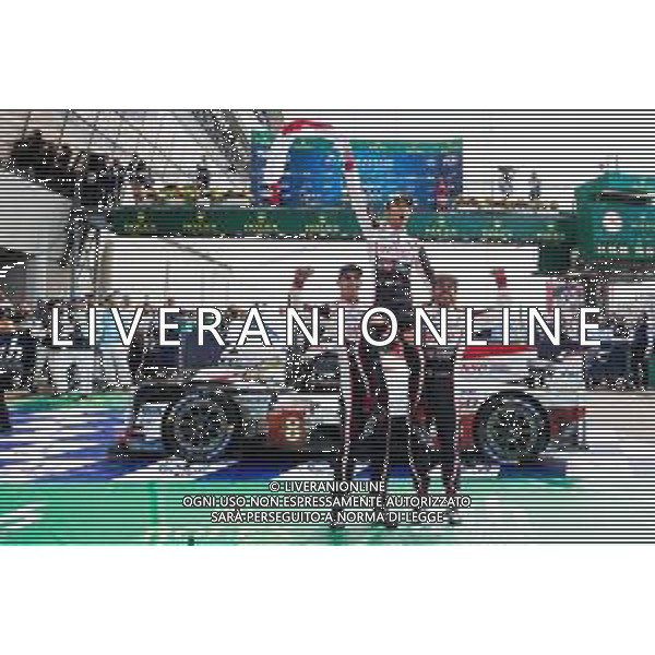 (L to R): Race winners Fernando Alonso (ESP); Kazuki Nakajima (JPN); and Sebastien Buemi (SUI) #08 Toyota Gazoo Racing, celebrate in parc ferme. 16-17.06.2018. FIA World Endurance Championship, Le Mans 24 Hours, Race, Le Mans, France. AG ALDO LIVERANI SAS-ONLY ITALY