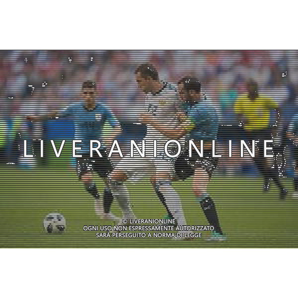 25.06.2018 SAMARA, SAMARA ARENA PILKA NOZNA (FOOTBALL) MISTRZOSTWA SWIATA ROSJA 2018 FIFA WORLD CUP RUSSIA 2018 URUGWAJ - ROSJA (URUGUAY-RUSSIA) NZ ARTEM DZYUBA DIEGO GODIN FOTO LUKASZ SKWIOT/CYFRASPORT / NEWSPIX.PL --- Newspix.pl AG ALDO LIVERANI SAS-ONLY ITALY