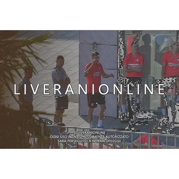 !!! EXCLUSIVE PHOTOS!!! !!! UWAGA ZDJECIA PAPARAZZI !!! BRAK ZGODY NA PUBLIKACJE WIZERUNKU !!! KADROWICZE PO PRZEGRANYM DRUGIM MECZU NA MUNDIALU RELAKSUJA SIE NA BASENIE. ZADOWOLENI USMIECHNIECI ZRELAKSOWANI WYCHODZA NA TRENING. WIEKSZOSC ZAWODNIKOW WYCHODZI Z TELEFONAMI NA TRENING. PRAWIE WSZYSCY SMIEJA SIE I SZUKAJA MIEJSCA SKAD SA ROBIONE IM ZDJECIA. JEDYNA PRZEJETA OSOBA JEST MICHAL PAZDAN KTORY CALY CZAS TRENINGU RZETELNIE PRACOWAL W SKUPIENIU I ZOSTAL JAKO OSTATNI Z DRUZYNY. MUNDIAL 2018 25.06.2018 SOCHI TOBIASZ/NEWSPIX --- Newspix.pl NZ robert lewandowski piotr zielinski i jan BEDNAREK Polish national team training in Sochi, part of the players training on the pitch, those who played with Colombia are training in the hotel, by the pool POLAND OUT!!! AG ALDO LIVERANI SAS-ONLY ITALY