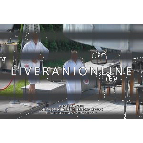 !!! EXCLUSIVE PHOTOS!!! !!! UWAGA ZDJECIA PAPARAZZI !!! BRAK ZGODY NA PUBLIKACJE WIZERUNKU !!! KADROWICZE PO PRZEGRANYM DRUGIM MECZU NA MUNDIALU RELAKSUJA SIE NA BASENIE. ZADOWOLENI USMIECHNIECI ZRELAKSOWANI WYCHODZA NA TRENING. WIEKSZOSC ZAWODNIKOW WYCHODZI Z TELEFONAMI NA TRENING. PRAWIE WSZYSCY SMIEJA SIE I SZUKAJA MIEJSCA SKAD SA ROBIONE IM ZDJECIA. JEDYNA PRZEJETA OSOBA JEST MICHAL PAZDAN KTORY CALY CZAS TRENINGU RZETELNIE PRACOWAL W SKUPIENIU I ZOSTAL JAKO OSTATNI Z DRUZYNY. N/Z JACEK GORLASKI I LUKASZ TEODORCZYK MUNDIAL 2018 25.06.2018 SOCHI TOBIASZ/NEWSPIX --- Newspix.pl Polish national team training in Sochi, part of the players training on the pitch, those who played with Colombia are training in the hotel, by the pool POLAND OUT!!! AG ALDO LIVERANI SAS-ONLY ITALY