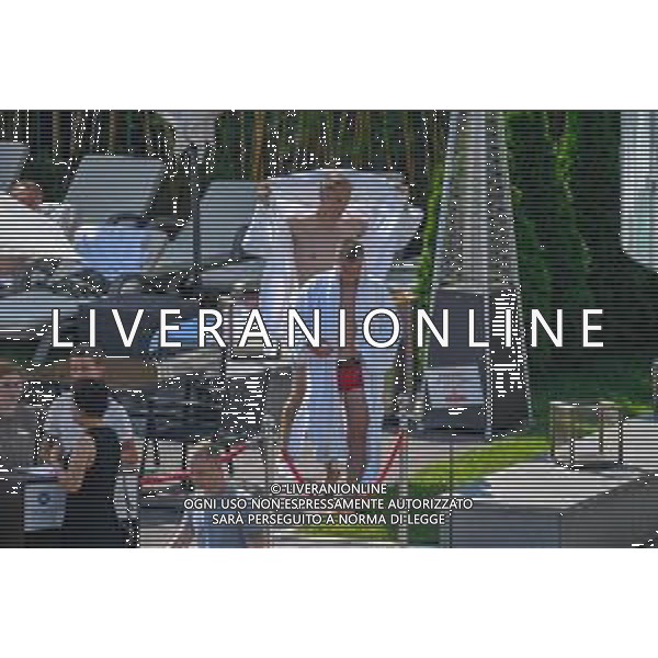 !!! EXCLUSIVE PHOTOS!!! !!! UWAGA ZDJECIA PAPARAZZI !!! BRAK ZGODY NA PUBLIKACJE WIZERUNKU !!! KADROWICZE PO PRZEGRANYM DRUGIM MECZU NA MUNDIALU RELAKSUJA SIE NA BASENIE. ZADOWOLENI USMIECHNIECI ZRELAKSOWANI WYCHODZA NA TRENING. WIEKSZOSC ZAWODNIKOW WYCHODZI Z TELEFONAMI NA TRENING. PRAWIE WSZYSCY SMIEJA SIE I SZUKAJA MIEJSCA SKAD SA ROBIONE IM ZDJECIA. JEDYNA PRZEJETA OSOBA JEST MICHAL PAZDAN KTORY CALY CZAS TRENINGU RZETELNIE PRACOWAL W SKUPIENIU I ZOSTAL JAKO OSTATNI Z DRUZYNY. N/Z JACEK GORLASKI I LUKASZ TEODORCZYK MUNDIAL 2018 25.06.2018 SOCHI TOBIASZ/NEWSPIX --- Newspix.pl Polish national team training in Sochi, part of the players training on the pitch, those who played with Colombia are training in the hotel, by the pool POLAND OUT!!! AG ALDO LIVERANI SAS-ONLY ITALY