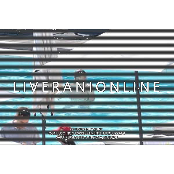 !!! EXCLUSIVE PHOTOS!!! !!! UWAGA ZDJECIA PAPARAZZI !!! BRAK ZGODY NA PUBLIKACJE WIZERUNKU !!! KADROWICZE PO PRZEGRANYM DRUGIM MECZU NA MUNDIALU RELAKSUJA SIE NA BASENIE. ZADOWOLENI USMIECHNIECI ZRELAKSOWANI WYCHODZA NA TRENING. WIEKSZOSC ZAWODNIKOW WYCHODZI Z TELEFONAMI NA TRENING. PRAWIE WSZYSCY SMIEJA SIE I SZUKAJA MIEJSCA SKAD SA ROBIONE IM ZDJECIA. JEDYNA PRZEJETA OSOBA JEST MICHAL PAZDAN KTORY CALY CZAS TRENINGU RZETELNIE PRACOWAL W SKUPIENIU I ZOSTAL JAKO OSTATNI Z DRUZYNY. N/Z artur JEDRZEJCZYK MUNDIAL 2018 25.06.2018 SOCHI TOBIASZ/NEWSPIX --- Newspix.pl Polish national team training in Sochi, part of the players training on the pitch, those who played with Colombia are training in the hotel, by the pool POLAND OUT!!! AG ALDO LIVERANI SAS-ONLY ITALY