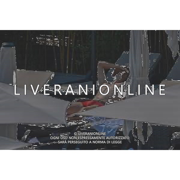 !!! EXCLUSIVE PHOTOS!!! !!! UWAGA ZDJECIA PAPARAZZI !!! BRAK ZGODY NA PUBLIKACJE WIZERUNKU !!! KADROWICZE PO PRZEGRANYM DRUGIM MECZU NA MUNDIALU RELAKSUJA SIE NA BASENIE. ZADOWOLENI USMIECHNIECI ZRELAKSOWANI WYCHODZA NA TRENING. WIEKSZOSC ZAWODNIKOW WYCHODZI Z TELEFONAMI NA TRENING. PRAWIE WSZYSCY SMIEJA SIE I SZUKAJA MIEJSCA SKAD SA ROBIONE IM ZDJECIA. JEDYNA PRZEJETA OSOBA JEST MICHAL PAZDAN KTORY CALY CZAS TRENINGU RZETELNIE PRACOWAL W SKUPIENIU I ZOSTAL JAKO OSTATNI Z DRUZYNY. N/Z JACEK GORLASKI I LUKASZ TEODORCZYK MUNDIAL 2018 25.06.2018 SOCHI TOBIASZ/NEWSPIX --- Newspix.pl Polish national team training in Sochi, part of the players training on the pitch, those who played with Colombia are training in the hotel, by the pool POLAND OUT!!! AG ALDO LIVERANI SAS-ONLY ITALY