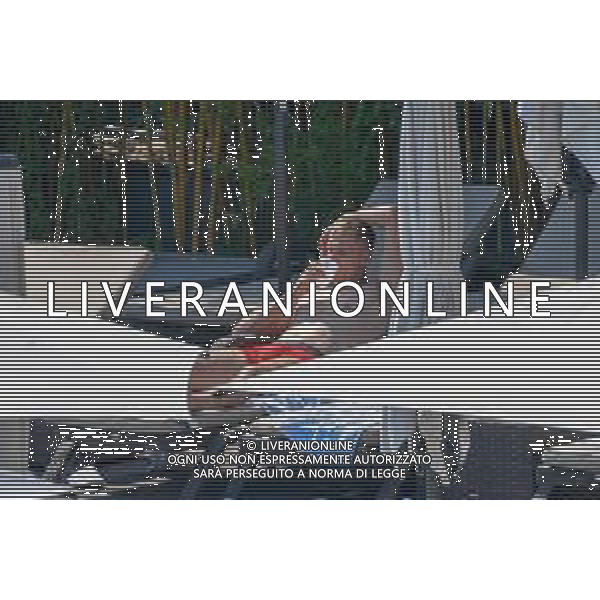 !!! EXCLUSIVE PHOTOS!!! !!! UWAGA ZDJECIA PAPARAZZI !!! BRAK ZGODY NA PUBLIKACJE WIZERUNKU !!! KADROWICZE PO PRZEGRANYM DRUGIM MECZU NA MUNDIALU RELAKSUJA SIE NA BASENIE. ZADOWOLENI USMIECHNIECI ZRELAKSOWANI WYCHODZA NA TRENING. WIEKSZOSC ZAWODNIKOW WYCHODZI Z TELEFONAMI NA TRENING. PRAWIE WSZYSCY SMIEJA SIE I SZUKAJA MIEJSCA SKAD SA ROBIONE IM ZDJECIA. JEDYNA PRZEJETA OSOBA JEST MICHAL PAZDAN KTORY CALY CZAS TRENINGU RZETELNIE PRACOWAL W SKUPIENIU I ZOSTAL JAKO OSTATNI Z DRUZYNY. N/Z LUKASZ TEODORCZYK MUNDIAL 2018 25.06.2018 SOCHI TOBIASZ/NEWSPIX --- Newspix.pl Polish national team training in Sochi, part of the players training on the pitch, those who played with Colombia are training in the hotel, by the pool POLAND OUT!!! AG ALDO LIVERANI SAS-ONLY ITALY