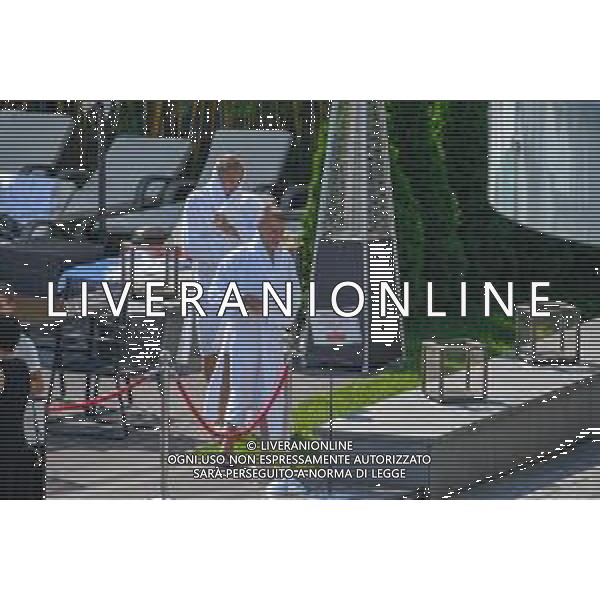 !!! EXCLUSIVE PHOTOS!!! !!! UWAGA ZDJECIA PAPARAZZI !!! BRAK ZGODY NA PUBLIKACJE WIZERUNKU !!! KADROWICZE PO PRZEGRANYM DRUGIM MECZU NA MUNDIALU RELAKSUJA SIE NA BASENIE. ZADOWOLENI USMIECHNIECI ZRELAKSOWANI WYCHODZA NA TRENING. WIEKSZOSC ZAWODNIKOW WYCHODZI Z TELEFONAMI NA TRENING. PRAWIE WSZYSCY SMIEJA SIE I SZUKAJA MIEJSCA SKAD SA ROBIONE IM ZDJECIA. JEDYNA PRZEJETA OSOBA JEST MICHAL PAZDAN KTORY CALY CZAS TRENINGU RZETELNIE PRACOWAL W SKUPIENIU I ZOSTAL JAKO OSTATNI Z DRUZYNY. N/Z JACEK GORLASKI I LUKASZ TEODORCZYK MUNDIAL 2018 25.06.2018 SOCHI TOBIASZ/NEWSPIX --- Newspix.pl Polish national team training in Sochi, part of the players training on the pitch, those who played with Colombia are training in the hotel, by the pool POLAND OUT!!! AG ALDO LIVERANI SAS-ONLY ITALY