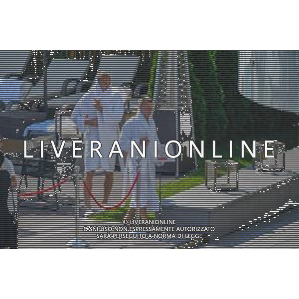 !!! EXCLUSIVE PHOTOS!!! !!! UWAGA ZDJECIA PAPARAZZI !!! BRAK ZGODY NA PUBLIKACJE WIZERUNKU !!! KADROWICZE PO PRZEGRANYM DRUGIM MECZU NA MUNDIALU RELAKSUJA SIE NA BASENIE. ZADOWOLENI USMIECHNIECI ZRELAKSOWANI WYCHODZA NA TRENING. WIEKSZOSC ZAWODNIKOW WYCHODZI Z TELEFONAMI NA TRENING. PRAWIE WSZYSCY SMIEJA SIE I SZUKAJA MIEJSCA SKAD SA ROBIONE IM ZDJECIA. JEDYNA PRZEJETA OSOBA JEST MICHAL PAZDAN KTORY CALY CZAS TRENINGU RZETELNIE PRACOWAL W SKUPIENIU I ZOSTAL JAKO OSTATNI Z DRUZYNY. N/Z JACEK GORLASKI I LUKASZ TEODORCZYK MUNDIAL 2018 25.06.2018 SOCHI TOBIASZ/NEWSPIX --- Newspix.pl Polish national team training in Sochi, part of the players training on the pitch, those who played with Colombia are training in the hotel, by the pool POLAND OUT!!! AG ALDO LIVERANI SAS-ONLY ITALY