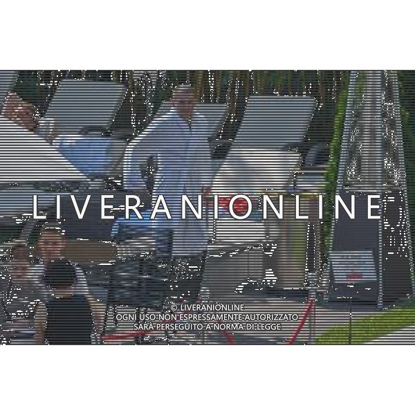 !!! EXCLUSIVE PHOTOS!!! !!! UWAGA ZDJECIA PAPARAZZI !!! BRAK ZGODY NA PUBLIKACJE WIZERUNKU !!! KADROWICZE PO PRZEGRANYM DRUGIM MECZU NA MUNDIALU RELAKSUJA SIE NA BASENIE. ZADOWOLENI USMIECHNIECI ZRELAKSOWANI WYCHODZA NA TRENING. WIEKSZOSC ZAWODNIKOW WYCHODZI Z TELEFONAMI NA TRENING. PRAWIE WSZYSCY SMIEJA SIE I SZUKAJA MIEJSCA SKAD SA ROBIONE IM ZDJECIA. JEDYNA PRZEJETA OSOBA JEST MICHAL PAZDAN KTORY CALY CZAS TRENINGU RZETELNIE PRACOWAL W SKUPIENIU I ZOSTAL JAKO OSTATNI Z DRUZYNY. N/Z artur JEDRZEJCZYK MUNDIAL 2018 25.06.2018 SOCHI TOBIASZ/NEWSPIX --- Newspix.pl Polish national team training in Sochi, part of the players training on the pitch, those who played with Colombia are training in the hotel, by the pool POLAND OUT!!! AG ALDO LIVERANI SAS-ONLY ITALY