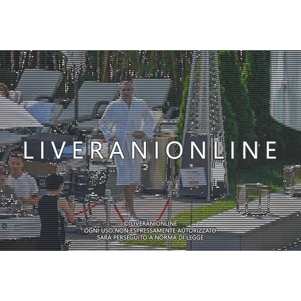 !!! EXCLUSIVE PHOTOS!!! !!! UWAGA ZDJECIA PAPARAZZI !!! BRAK ZGODY NA PUBLIKACJE WIZERUNKU !!! KADROWICZE PO PRZEGRANYM DRUGIM MECZU NA MUNDIALU RELAKSUJA SIE NA BASENIE. ZADOWOLENI USMIECHNIECI ZRELAKSOWANI WYCHODZA NA TRENING. WIEKSZOSC ZAWODNIKOW WYCHODZI Z TELEFONAMI NA TRENING. PRAWIE WSZYSCY SMIEJA SIE I SZUKAJA MIEJSCA SKAD SA ROBIONE IM ZDJECIA. JEDYNA PRZEJETA OSOBA JEST MICHAL PAZDAN KTORY CALY CZAS TRENINGU RZETELNIE PRACOWAL W SKUPIENIU I ZOSTAL JAKO OSTATNI Z DRUZYNY. N/Z artur JEDRZEJCZYK MUNDIAL 2018 25.06.2018 SOCHI TOBIASZ/NEWSPIX --- Newspix.pl Polish national team training in Sochi, part of the players training on the pitch, those who played with Colombia are training in the hotel, by the pool POLAND OUT!!! AG ALDO LIVERANI SAS-ONLY ITALY