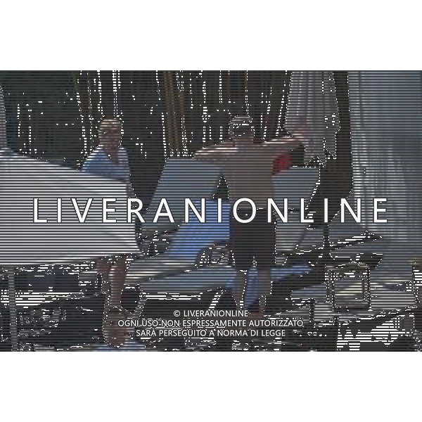 !!! EXCLUSIVE PHOTOS!!! !!! UWAGA ZDJECIA PAPARAZZI !!! BRAK ZGODY NA PUBLIKACJE WIZERUNKU !!! KADROWICZE PO PRZEGRANYM DRUGIM MECZU NA MUNDIALU RELAKSUJA SIE NA BASENIE. ZADOWOLENI USMIECHNIECI ZRELAKSOWANI WYCHODZA NA TRENING. WIEKSZOSC ZAWODNIKOW WYCHODZI Z TELEFONAMI NA TRENING. PRAWIE WSZYSCY SMIEJA SIE I SZUKAJA MIEJSCA SKAD SA ROBIONE IM ZDJECIA. JEDYNA PRZEJETA OSOBA JEST MICHAL PAZDAN KTORY CALY CZAS TRENINGU RZETELNIE PRACOWAL W SKUPIENIU I ZOSTAL JAKO OSTATNI Z DRUZYNY. MUNDIAL 2018 25.06.2018 SOCHI TOBIASZ/NEWSPIX --- Newspix.pl NZ ZBIGNIEW BONIEK Polish national team training in Sochi, part of the players training on the pitch, those who played with Colombia are training in the hotel, by the pool POLAND OUT!!! AG ALDO LIVERANI SAS-ONLY ITALY